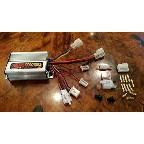 Contrôleur de vitesse 750 watts pour moto/moped avec arrêt de braquage et connecteur de feux stop. Contrôleur de vitesse 750 watts pour moto/moped avec arrêt de braquage et connecteur de feux stop.